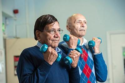 two older men exercise